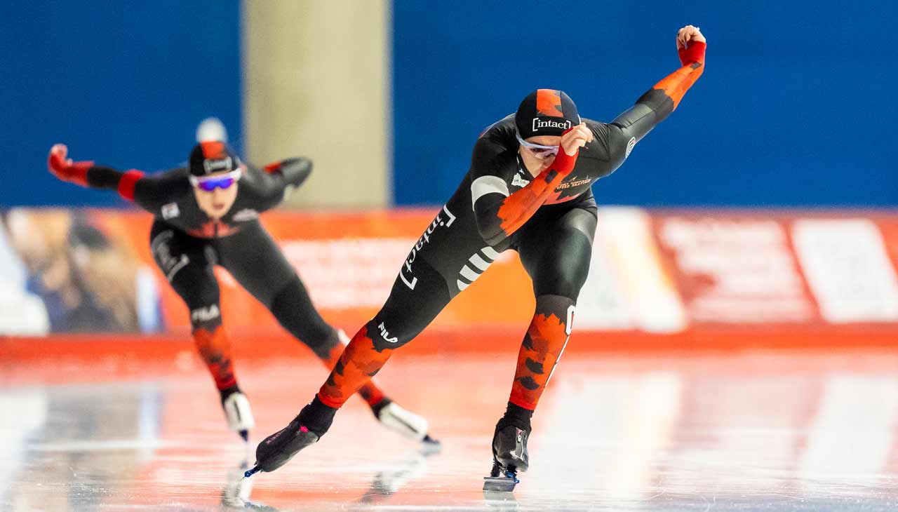 Dave Holland image of two Canadian speed skaters